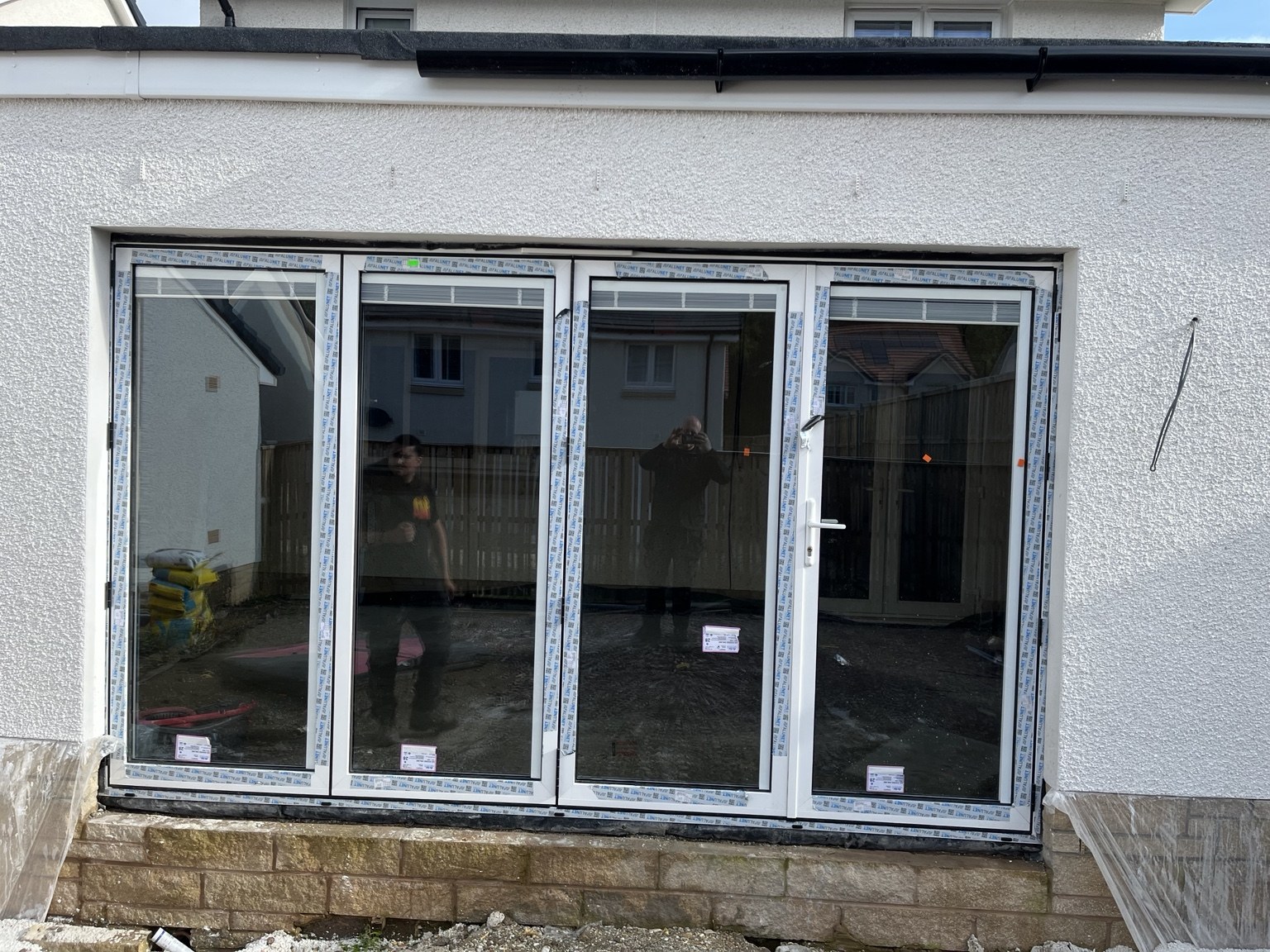 Exterior view of the newly fitted folding doors.