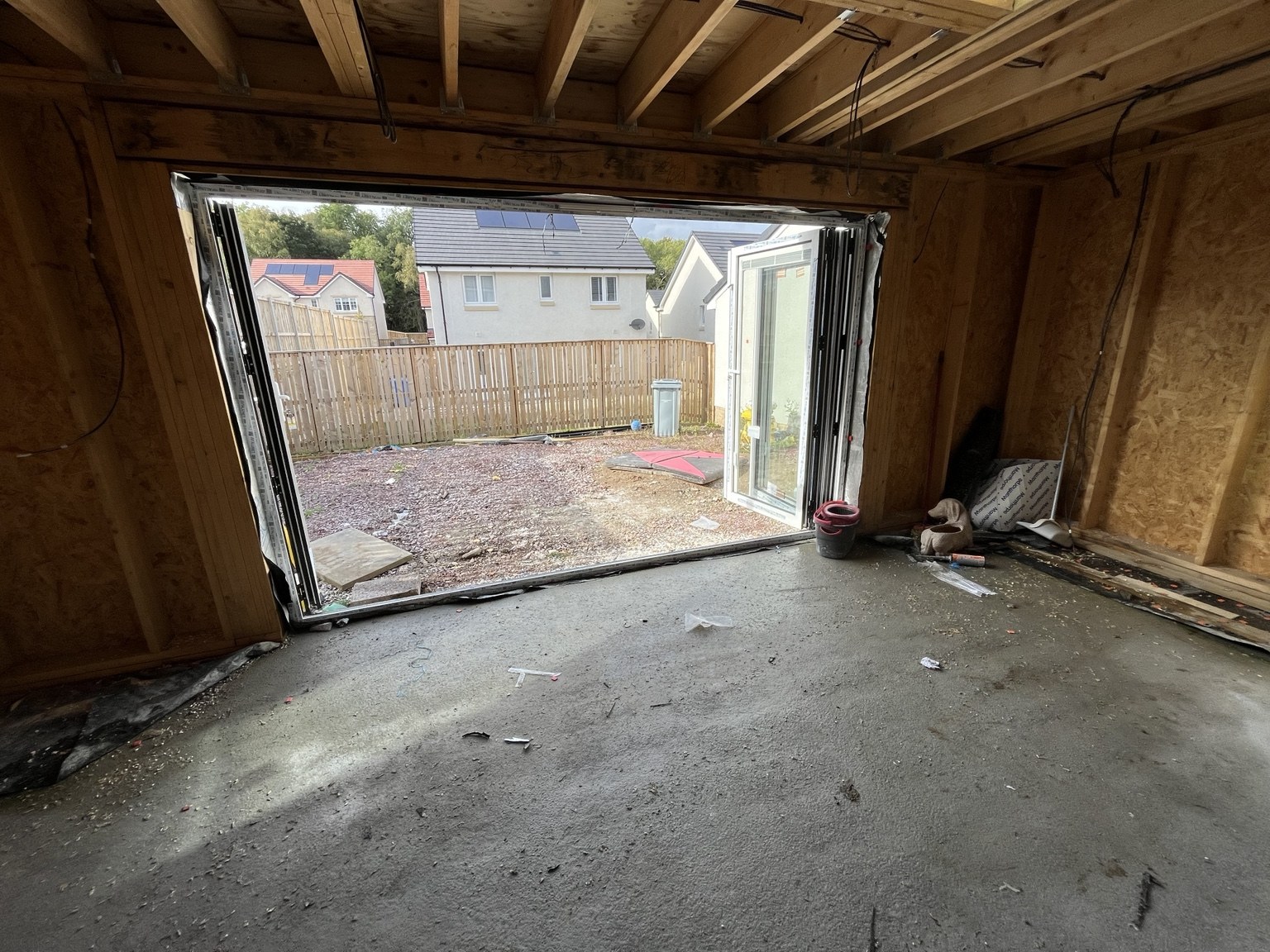 Folding doors fitted, opening the extension out to the garden.