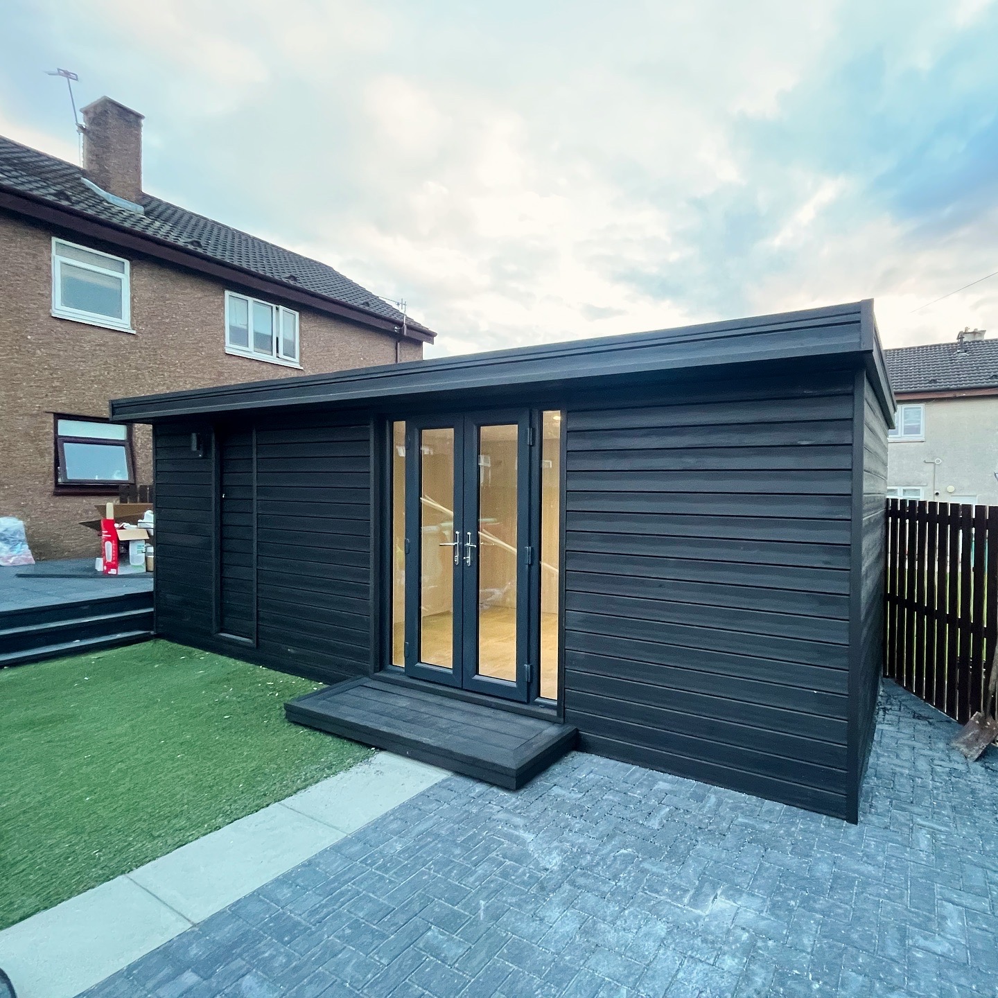 Black composite-clad garden room