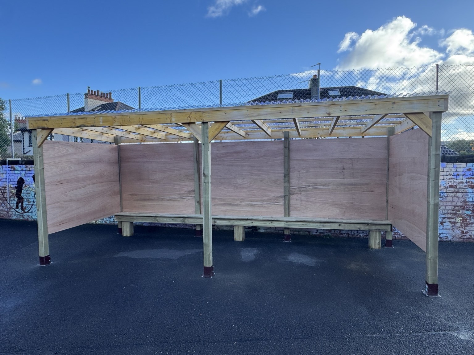 Timber pergola with built-in bench at Kings Park Primary